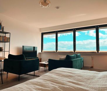 Stilvolles Design-Apartment mit Weitblick im 11. Stock - Photo 1