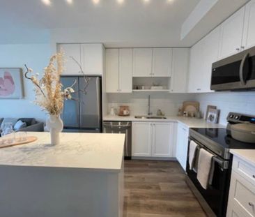 Unit 114- Beautifully Designed/ 2 Bedrooms Plus Den Condo at The Grove - Photo 2