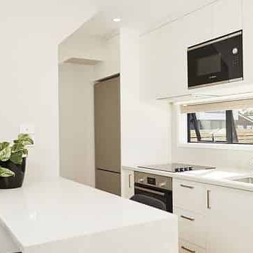 Modern One-Bedroom Townhouse in Prime Location - Photo 1