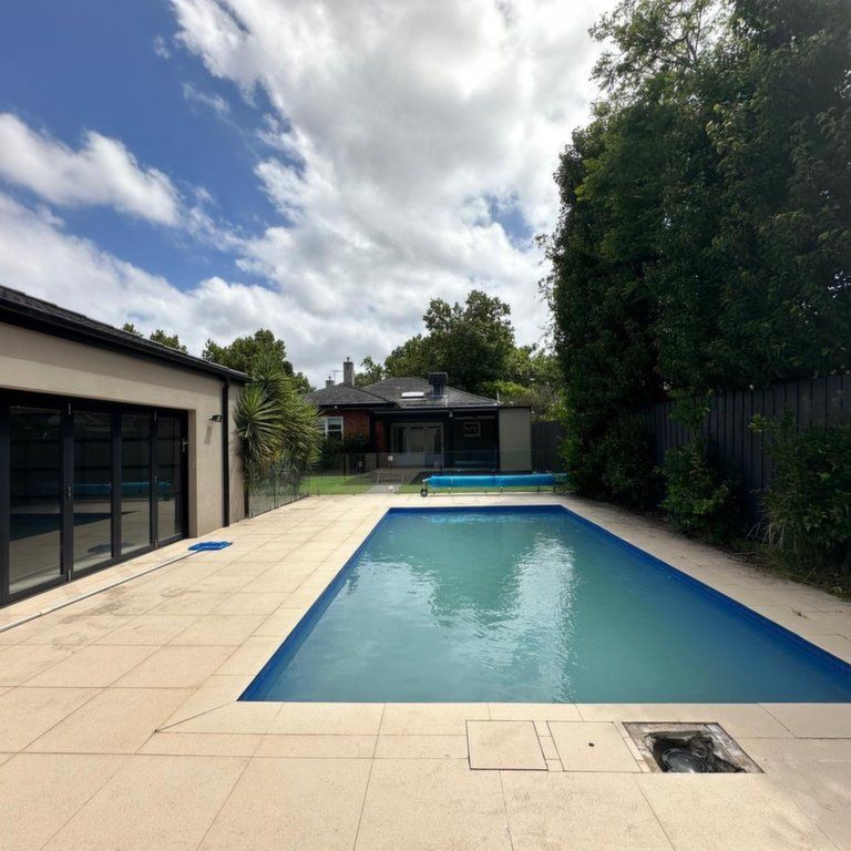 Beautiful Art Deco Home with a Pool across Parkland - Photo 1