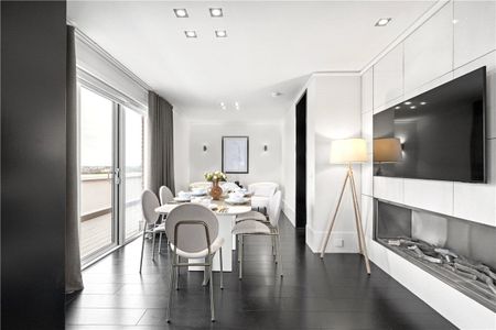 A magnificent 11th & 12th floor modern duplex (Penthouse) with a large private roof terrace in a popular and well run residential block with 24 hour porterage and communal gardens. Minimum Tenancy Length: Minimum 12 months EPC rating: D | Council Tax Band H - Photo 5