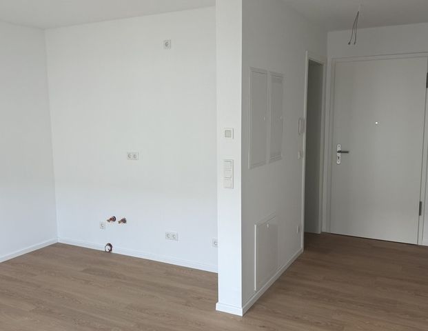 Neubau-Erstbezug! Stilvolle 1-Zimmer-Wohnung in zentraler Lage - Photo 1