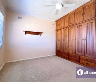 Spacious 4-Bedroom Home in Prime Family-Friendly Location - Photo 2