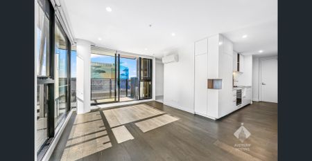 Sleek Urban Living at Its Finest I Unfurnished with Car Stacker - Photo 2