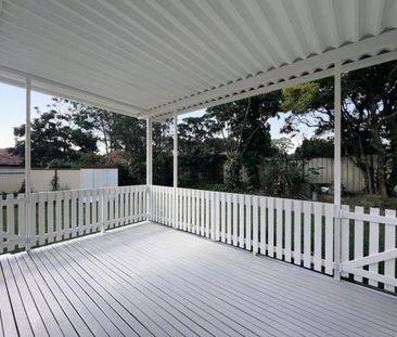 Charming Brick Home with Modern Renovations and Versatile Living Sp... - Photo 5