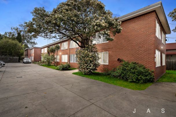 “Renovated Comfort Just Moments from Highpoint” - Photo 1