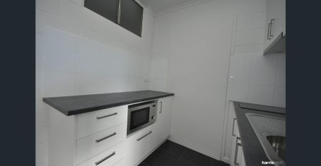 Vibrant Location + Updated Apartment = Unreal Living - Photo 3