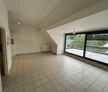 Instapklaar dakappartement met ruim terras in Olen - Photo 1