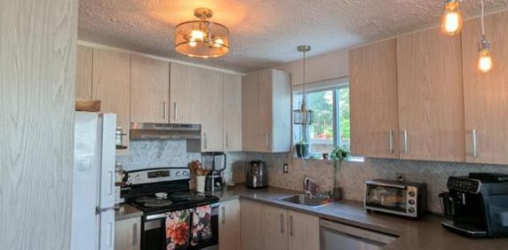 4-1/2 + 1 grand local (buanderie et rangement) - Photo 2