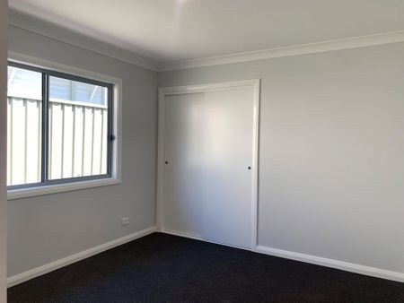 Near-new unit offering low-maintenance living - Photo 2