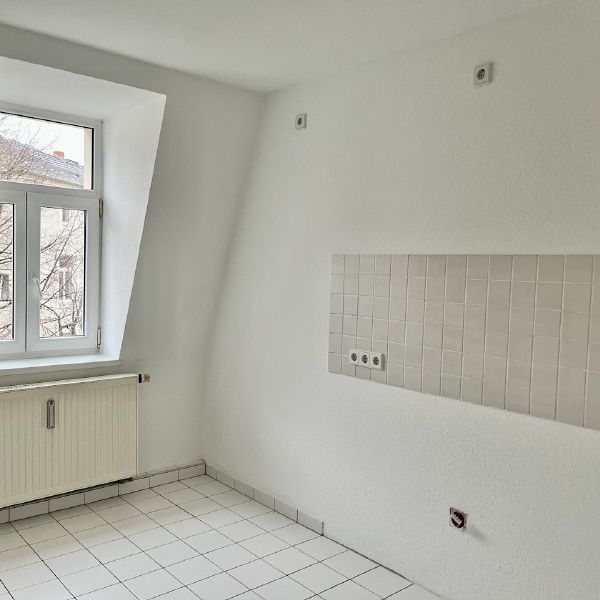 Raffiniert wohnen unterm Dach! - Foto 1