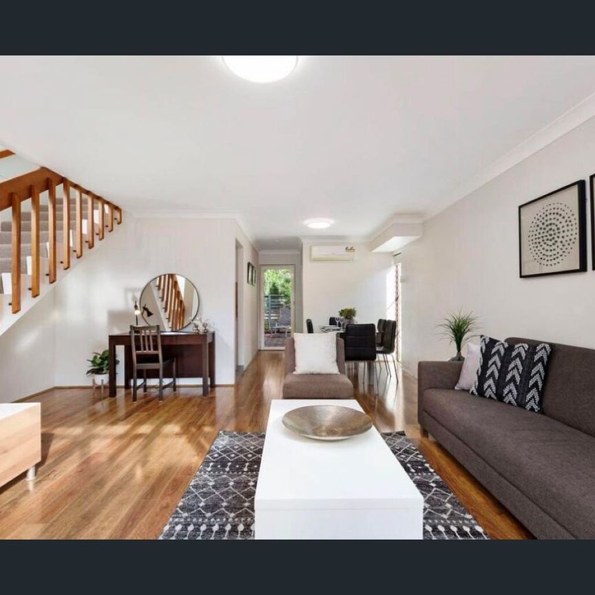 Split Level Townhouse in Private Setting - Photo 1