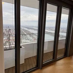 Sky Living im 32. Stock | Private Loge über der Alten Donau - Photo 3