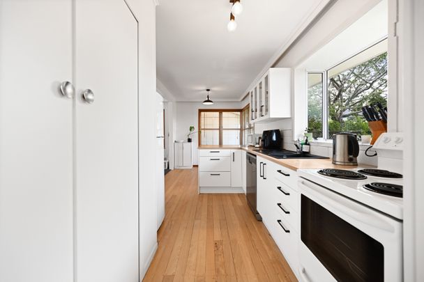 This a fantastic, neat and tidy home with a large living room with ranch slider to the front deck, dining room open to the runway kitchen, three bedrooms, full family bathroom with bath and shower, large yard with bountiful fruit trees, double carport, at the end of a quiet cul de sac. - Photo 1