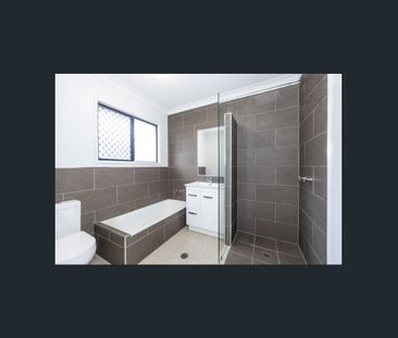 Spacious, Modern Living with Style and Comfort - Photo 3