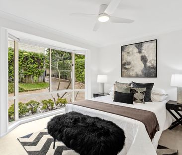 PEACEFUL SINGLE LEVEL LIVING IN A LEAFY SETTING - Photo 4