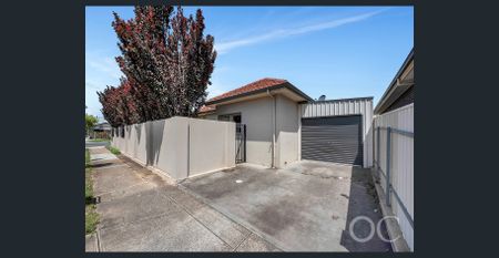 Open the Door to Style, Security, and Location in Woodville South - Photo 3