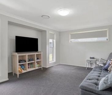 Four Bedroom House with Ducted AC! - Photo 1