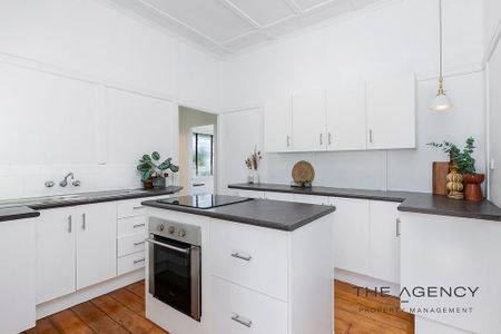 Comfortable 3-Bedroom Home in Convenient Berserker Location - Photo 2