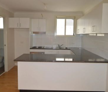Cute & Cosy 3 Bedrom home with air conditioning - Photo 1
