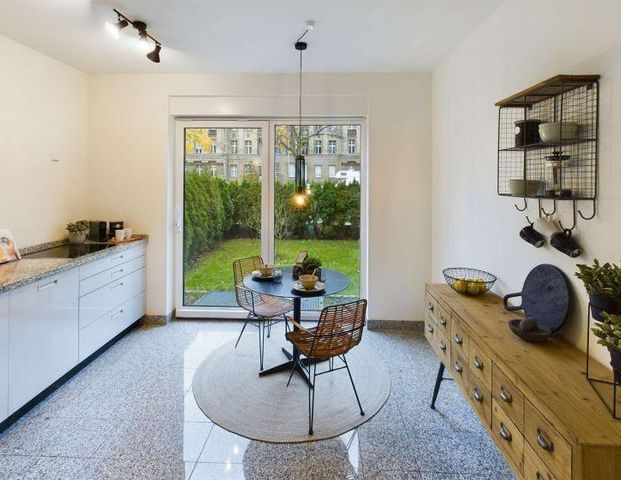 Gartenwohnung mit großzügiger Sonnenterrasse und privatem Gartenparadies - Photo 1