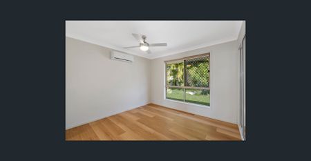 Updated Family Gem with Extra Living Space and Easy-Care Style - Photo 2