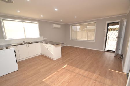 Renovated Unit with Large Yard. Water Usage Included. - Photo 5