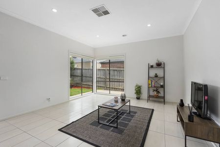 SITUATED IN POPULAR ARENA ESTATE..IS THIS SOUGHT AFTER 4 BEDROOM FAMILY HOME... - Photo 2