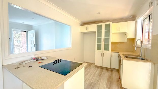 RENOVATED HOME - Photo 1