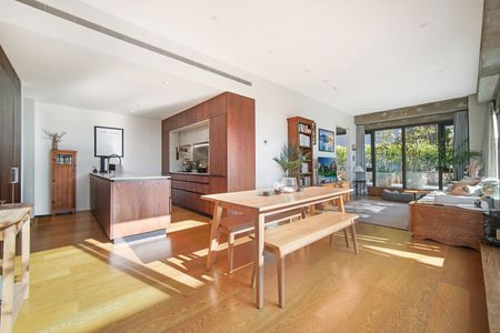 Stylish City-Fringe Apartment with Huge Private Deck - Photo 4