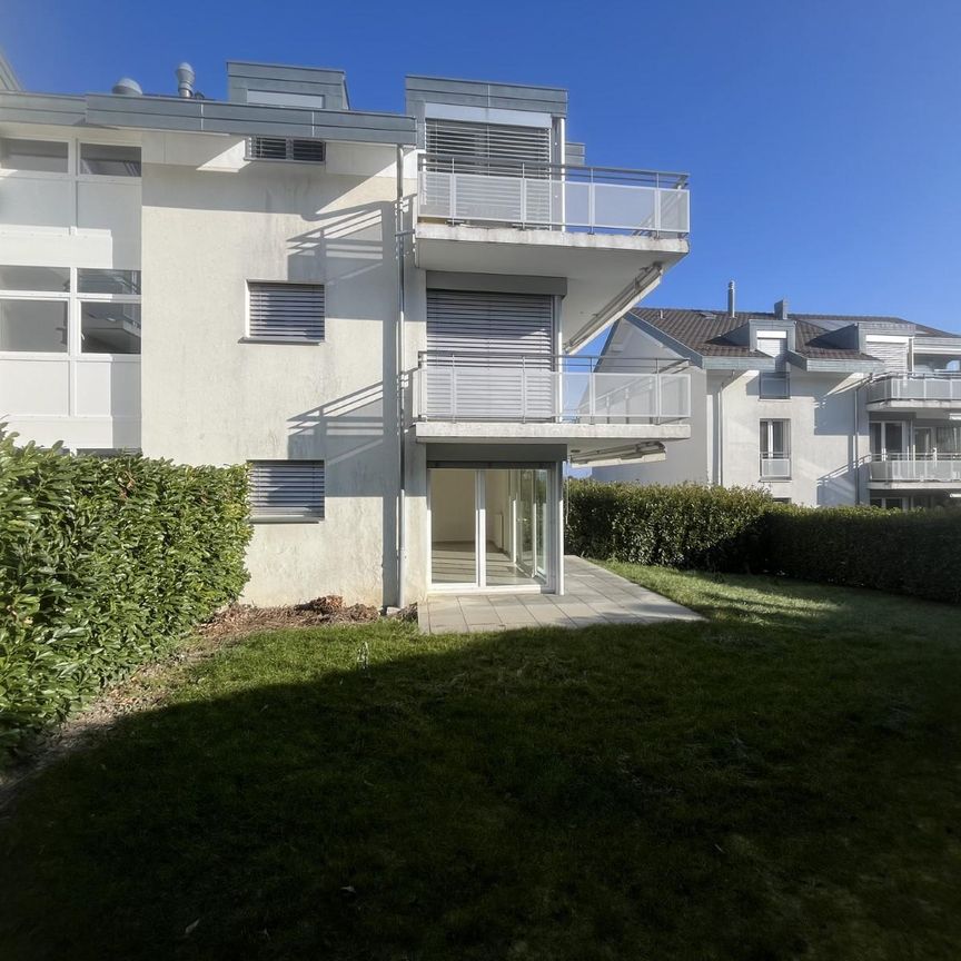 Bel appartement de 3 pièces au rez-de-chaussée avec terrasse et jardin - Photo 1