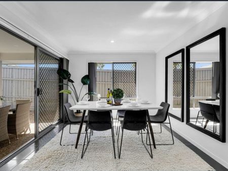 Modern 4-Bed Family Home with Dual Living Spaces in Vibrant Yarrabilba - Photo 3