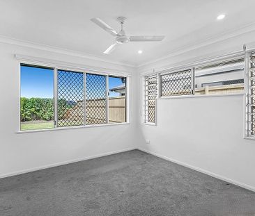 Modern 4 Bedroom Family Home on Low Maintenance, Fenced Block - Photo 6
