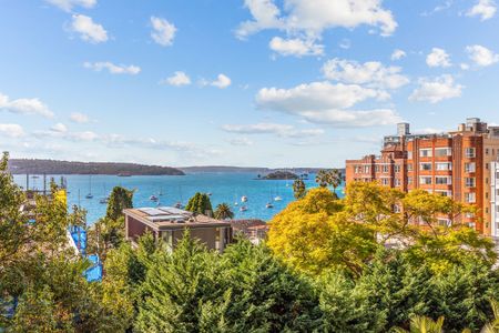 Architecturally Re-Designed Apartment with Northern Harbour Views - Photo 2