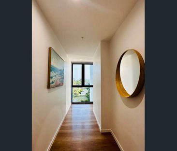 Available Now | Nearly-New Corner Waterfront Apartment with River V... - Photo 2