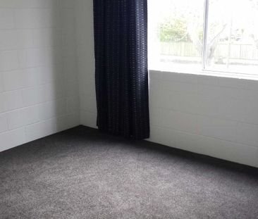 Nicely presented, upstairs, two bedroom unit. - Photo 1