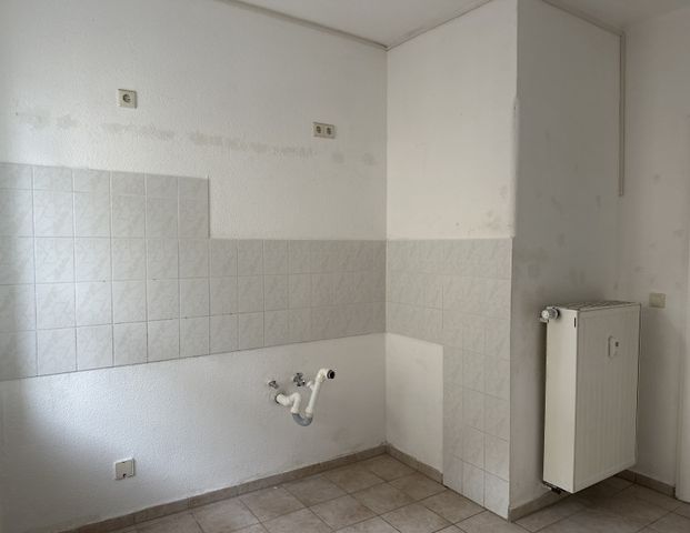 Zentrale 2-Zimmer-Erdgeschosswohnung mit optimaler Anbindung - Foto 1