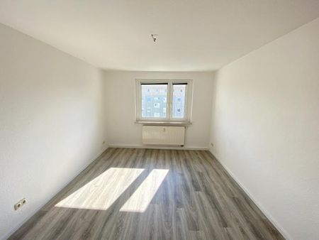 Schicke Dreiraumwohnung mit Balkon - Foto 5