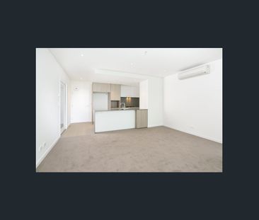Modern 2 Bedroom + MPR Apartment with River Views in Riverlight East - Photo 1