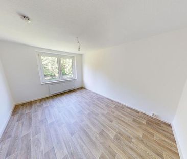 Erdgeschosswohnung mit Tageslichtbad - Foto 1