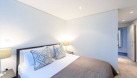 This stunning interior designed luxury apartment has three spacious and light bedrooms situated on the First floor of this prestigious building which features a concierge service, lift service and secure underground parking. EPC B / Council Tax E - Photo 3