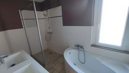 Location Appartement 4 pièces 101m² MONTBELIARD 25200 - Photo 2