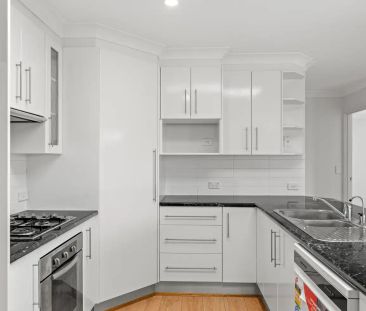 “Charming Family Home in Erina Awaits!” - Photo 2