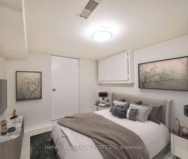 Very spacious affordable unit high ceilings + den! - Photo 3