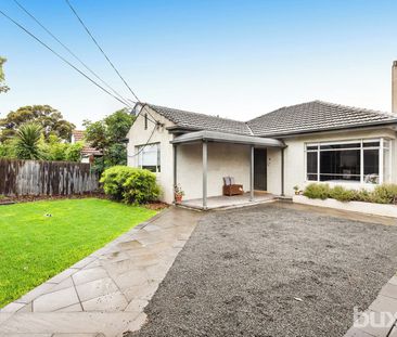 Neat & Tidy 4 Bedroom Home With Garden and Basketball Court! - Photo 1