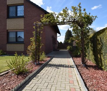 Erdgeschosswohnung mit Garage und Garten in schöner Wohnlage in Barßel - Foto 4