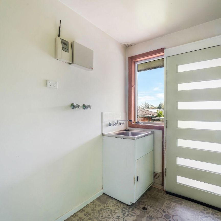 Well-Presented Family Home with Expansive Outdoor Living - Photo 1