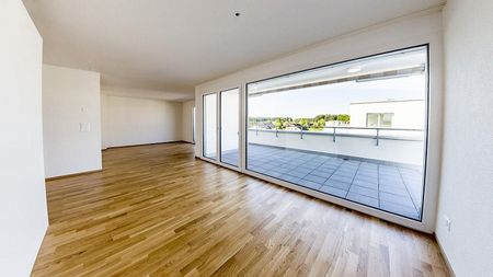 Moderne 3½ ZWG Attika im Dorfzentrum - Foto 2