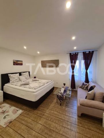 Garsoniera moderna 32mp de inchiriat in centrul Sibiului - Fotografie 3