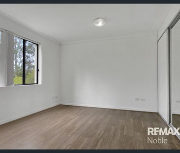 Spacious Townhouse with Back Yard - Photo 3
